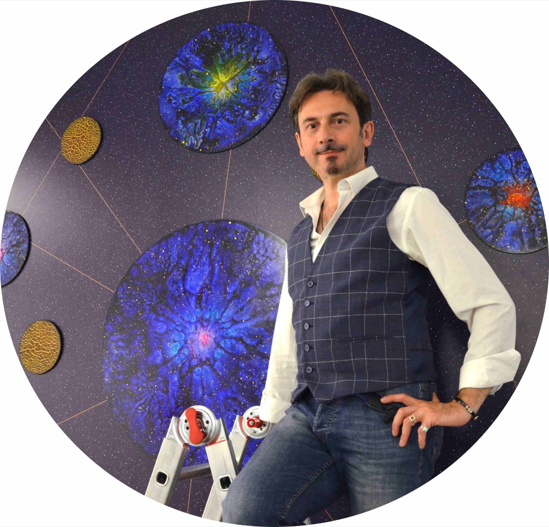 Enrico Magnani in front of the Quintessence wall during the installation, 2020