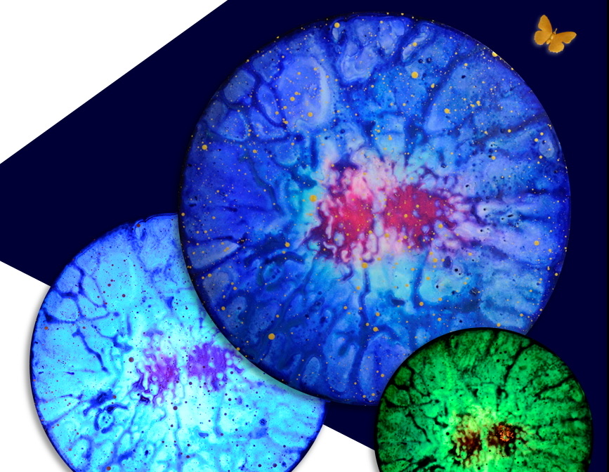 Supernova Dark Energy No. 1, 2021: three round works, one glowing green in the dark